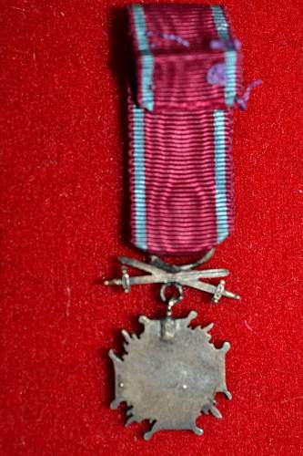 Miniature of Bronze Cross of Merit with Swords.