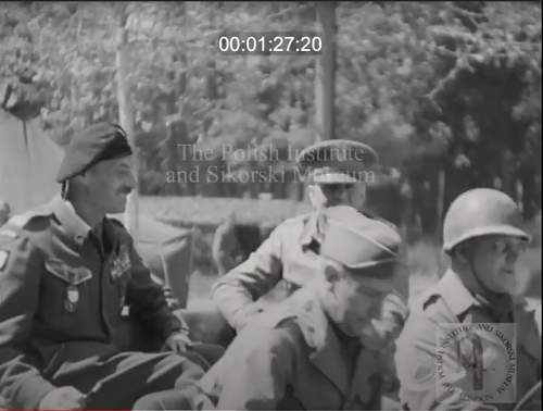 Need your help for identify soldier on photo (inside truck)