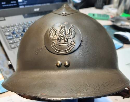 Polish helmet insigne real or reproduction ?