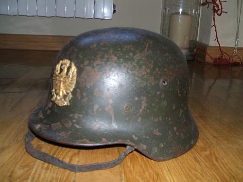 German Helmet with Polish Emblem on it ?