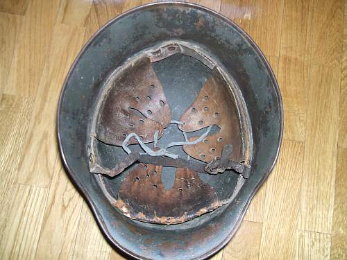 German Helmet with Polish Emblem on it ?