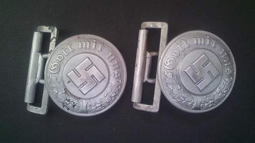 Two police buckles marked SS ??