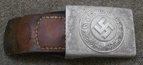 Unusual leather tab on the buckle.