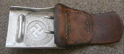 Unusual leather tab on the buckle.