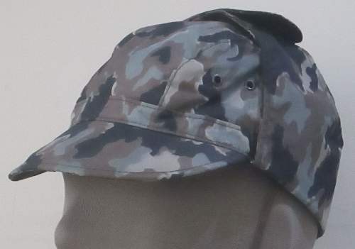 Post WW 2 cloth field headgear.