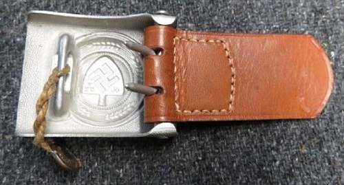 RAD buckle with the badge of the procurement service