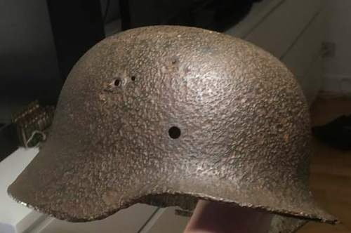 Bought a german relic helmet, need help with id and if its real