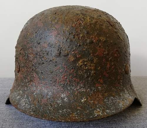 M42 Stahlhelm SD WH repaint with traces of wintercamo.