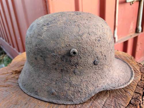Rare m16 helmet with red star on the front. help