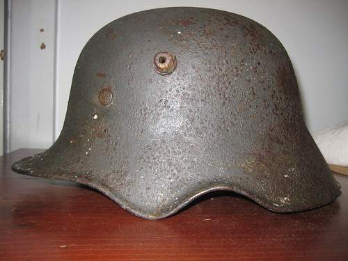 German m18 ear cut out relic helmet number