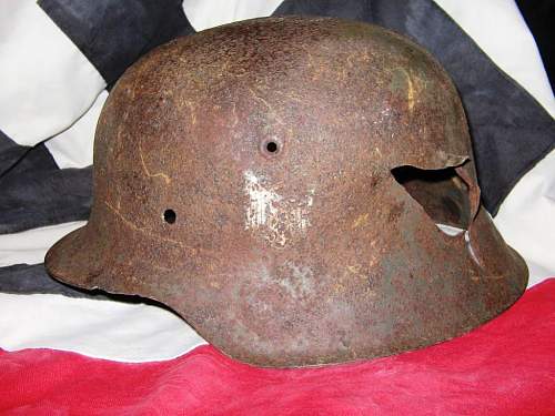 My German WWII relic helmet collection