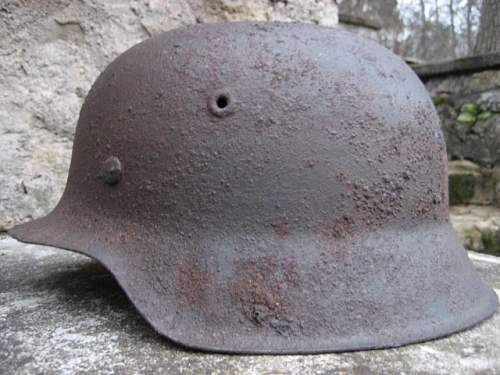 two M42 relic helmets from -NORDLAND's positions
