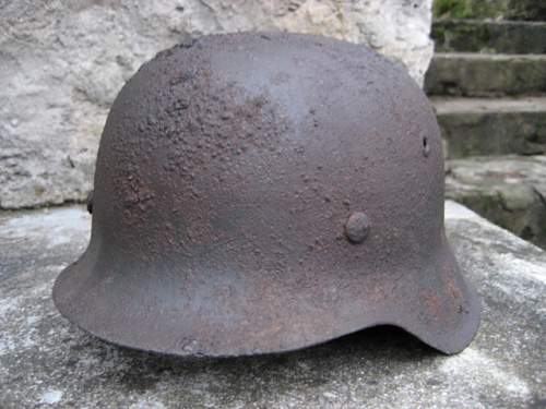 two M42 relic helmets from -NORDLAND's positions