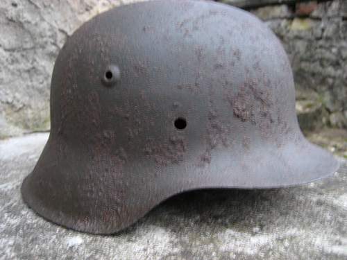 two M42 relic helmets from -NORDLAND's positions