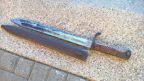 How to clean black spots from bayonet blade?