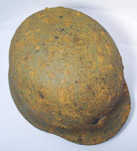 Battle Damaged M40 Relic Helmet: Restoration Candidate?