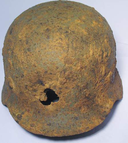 Battle Damaged M40 Relic Helmet: Restoration Candidate?