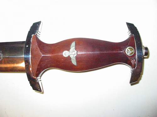 SA dagger with wood damage.