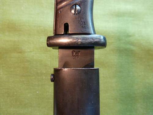 84/98 with number stamped crossguard