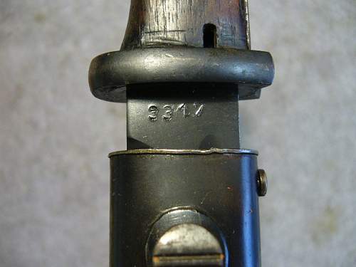 84/98 with number stamped crossguard