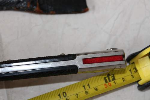 Short  Military bayonet with red insert, please help to ID