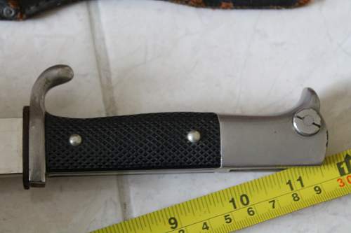 Short  Military bayonet with red insert, please help to ID