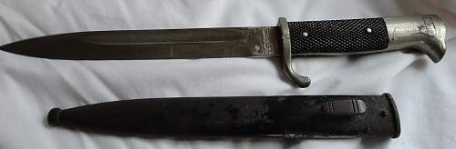 Short  Military bayonet with red insert, please help to ID