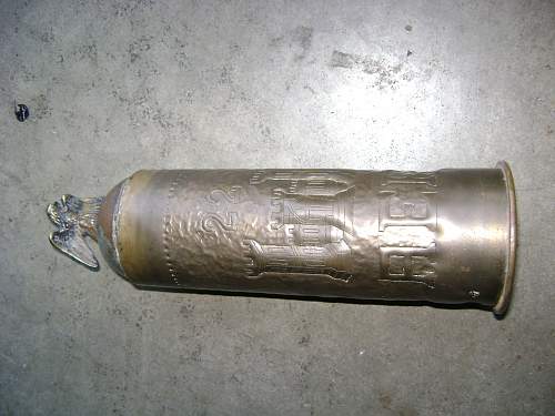 This cartridge case trench art has a 22 engraved castle