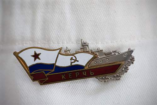 Russian submarine and Ukraine Sea Guard badges