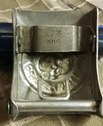 Skull belt buckle, fake, or real ? Who used the &quot;Skull&quot; buckles?