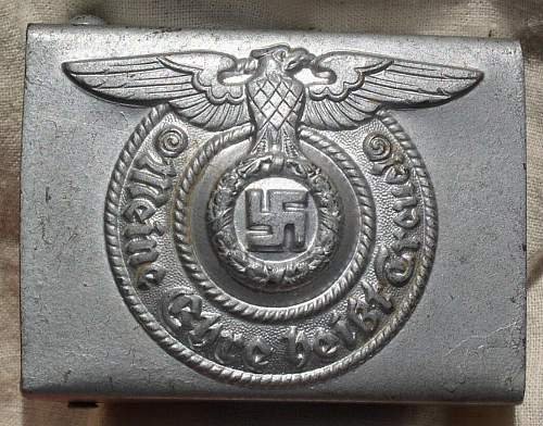 SS EM/NCO belt buckle. Real or fake?