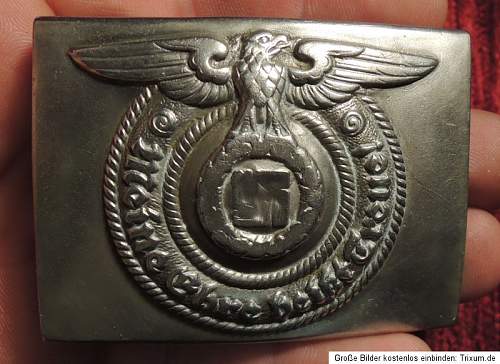 SS nickel OLC belt buckle genuine?