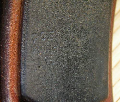 Fake SS leather markings ( belt &amp; cross straps D rings etc)