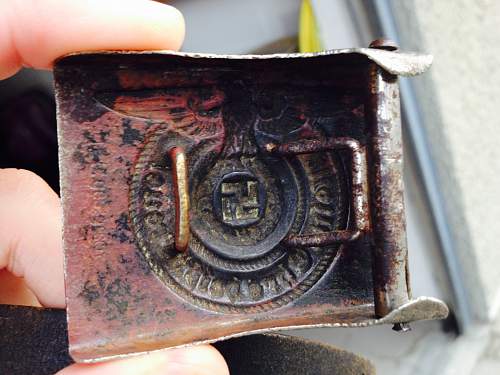 SS OLC belt buckle genuine?