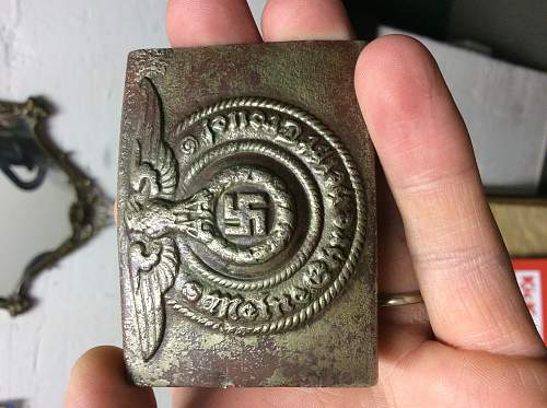 SS OLC belt buckle genuine?