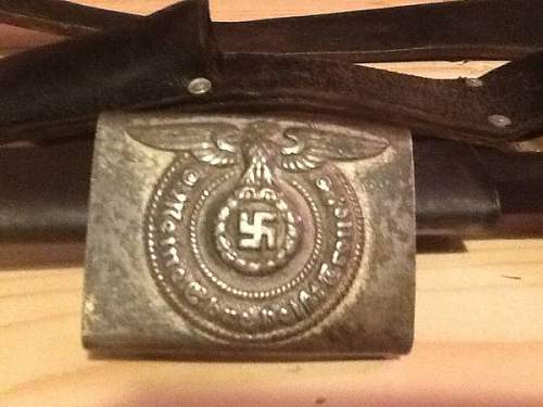 SS belt buckle is it real? got to meet someone today so need answere please!!!