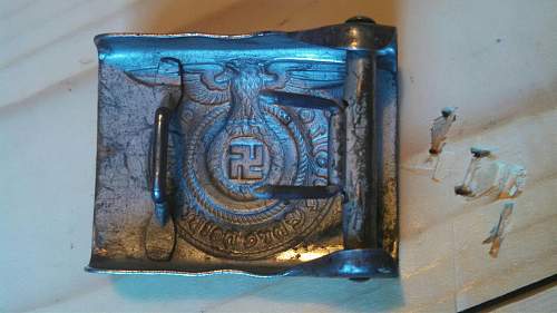 SS belt buckle is it real? got to meet someone today so need answere please!!!