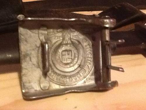 SS belt buckle is it real? got to meet someone today so need answere please!!!