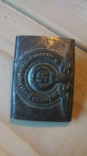 SS belt buckle is it real? got to meet someone today so need answere please!!!