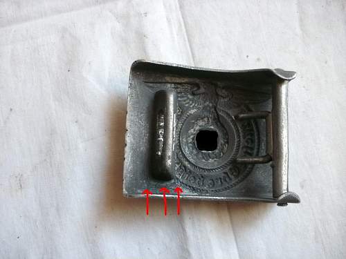 SS belt buckle unmarked  fake?