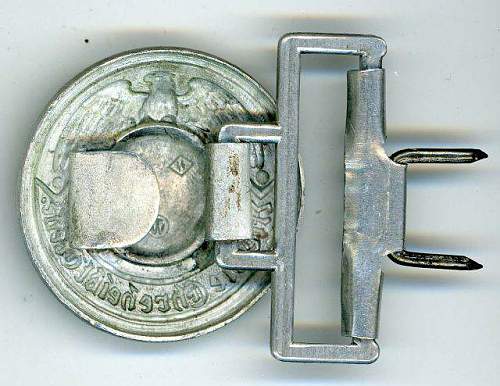 WWII Waffen SS Officers Belt Buckle. Measures 1 7/8” in diameter. The reverse is marked ‘RZM SS TW’