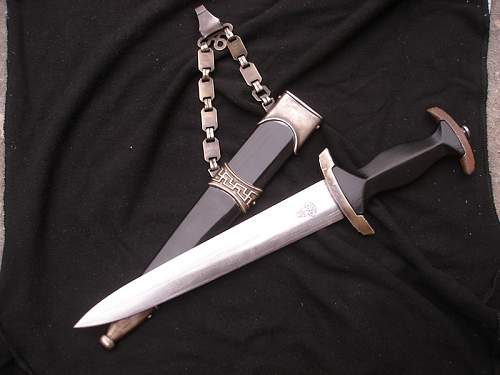 SS dagger with chain ask for an opinion