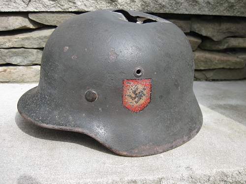 SS helmet with battle damage - Need help if legit or not