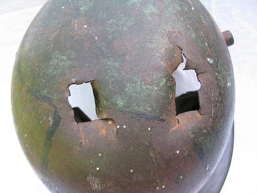 SS helmet with battle damage - Need help if legit or not