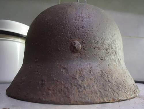 SS helmet with at least a fake swastika decal ?
