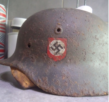 SS helmet with at least a fake swastika decal ?