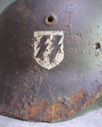 SS helmet with at least a fake swastika decal ?