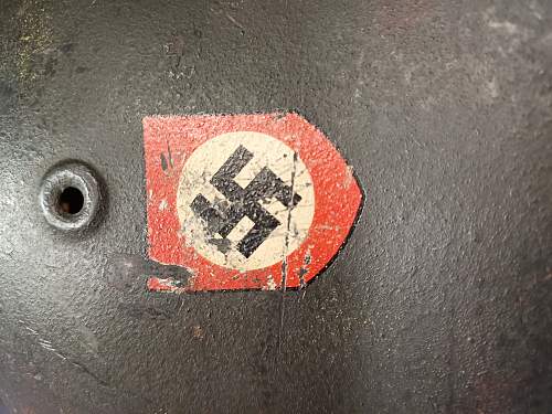 SS helmet with at least a fake swastika decal ?