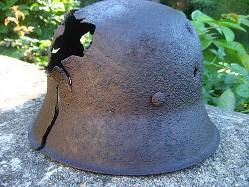 One more battlefield damaged m42 SS helmet  from Lett.19.SS.Frw.Div.position