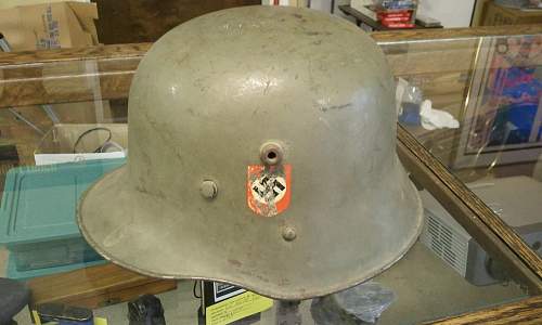 Help in identification and authenticity. SS and swastika green helmet